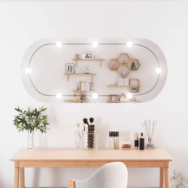 Miroir mural avec lumières LED 45x100 cm verre ovale